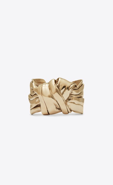 Draped bow cuff bracelet in light gold metal